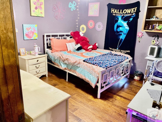 bedroom featuring light hardwood / wood-style floors