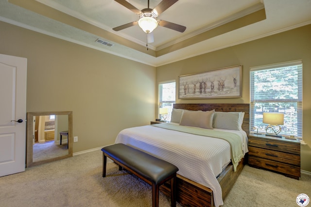 3428 Garrett Ln, Texarkana, TX 75503 - bedroom with a tray ceiling, light colored carpet, ornamental molding, and ceiling fan