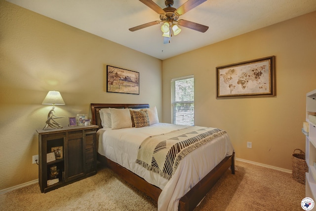 3428 Garrett Ln, Texarkana, TX 75503 - bedroom featuring light carpet and a ceiling fan