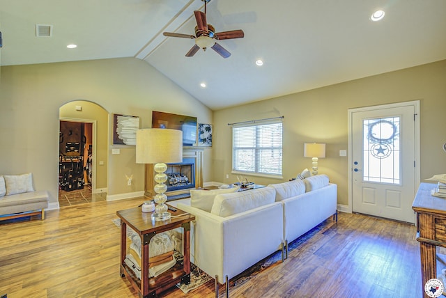 3428 Garrett Ln, Texarkana, TX 75503 - living area featuring ceiling fan, wood finished floors, lofted ceiling, recessed lighting, and a fireplace