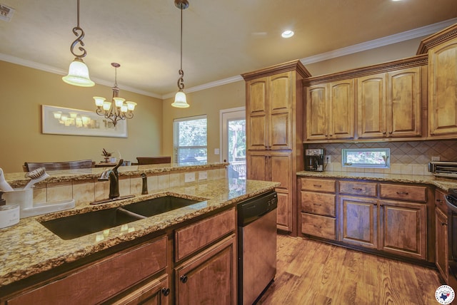3428 Garrett Ln, Texarkana, TX 75503 - kitchen featuring stainless steel dishwasher, light wood-style flooring, light stone counters, tasteful backsplash, and decorative light fixtures