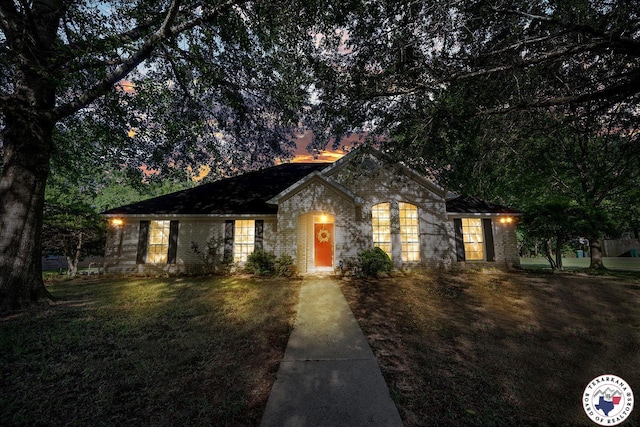 6102 Deerfield Dr, Texarkana, TX 75503 - ranch-style house with brick siding and a front yard
