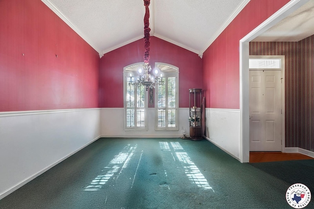 6102 Deerfield Dr, Texarkana, TX 75503 - unfurnished dining area featuring ornamental molding, a chandelier, carpet, vaulted ceiling, and a textured ceiling