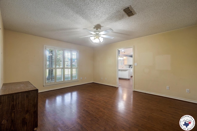 6102 Deerfield Dr, Texarkana, TX 75503 - unfurnished room featuring ceiling fan, wood finished floors, baseboards, and a textured ceiling