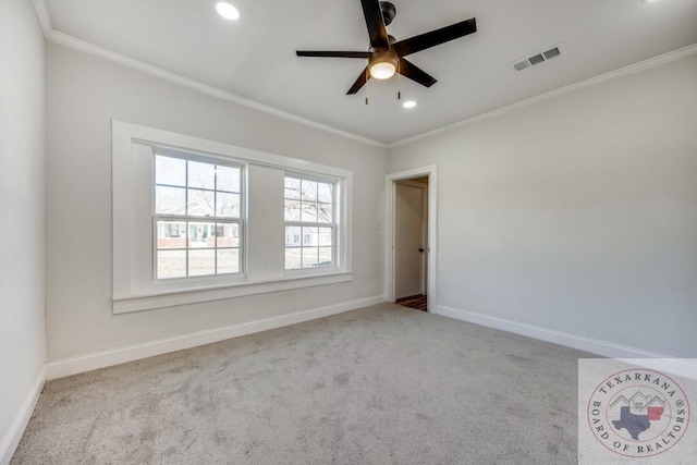 908 W Washington St, Clarksville, TX 75426 - carpeted spare room featuring ceiling fan and ornamental molding