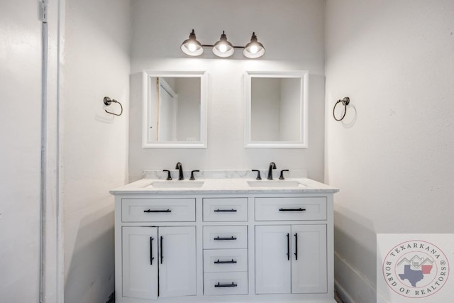 908 W Washington St, Clarksville, TX 75426 - bathroom featuring vanity