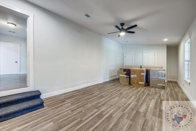 908 W Washington St, Clarksville, TX 75426 - interior space featuring ceiling fan and light wood-type flooring