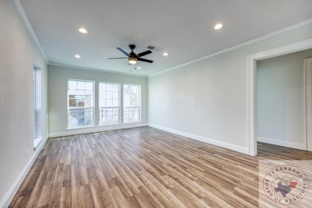 908 W Washington St, Clarksville, TX 75426 - spare room with ceiling fan, light hardwood / wood-style flooring, and crown molding