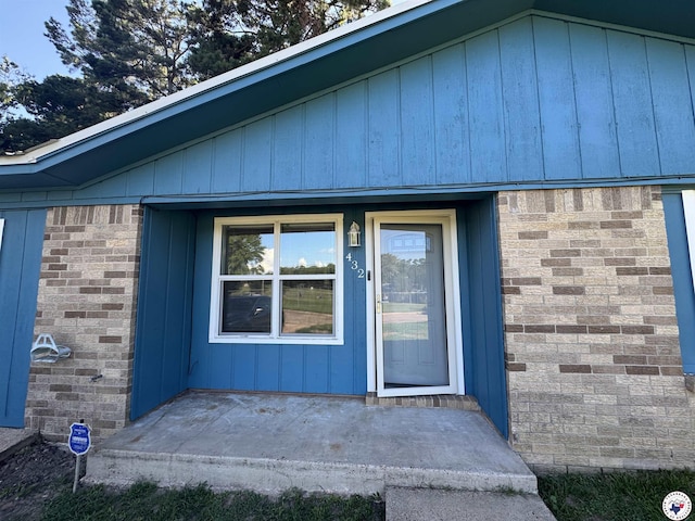 432 Carrol Ave, Wake Village, TX 75501 - doorway to property with brick siding