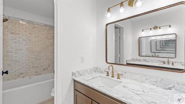 full bath featuring toilet, shower / tub combination, and vanity