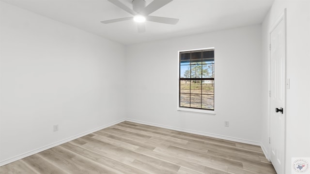 unfurnished room featuring light wood-type flooring, ceiling fan, and baseboards