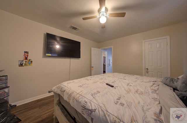 bedroom featuring ceiling fan and dark hardwood / wood-style floors