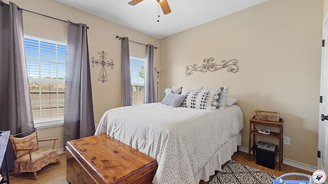 908 Arnold Ln, Texarkana, TX 75503 - bedroom featuring wood finished floors and a ceiling fan