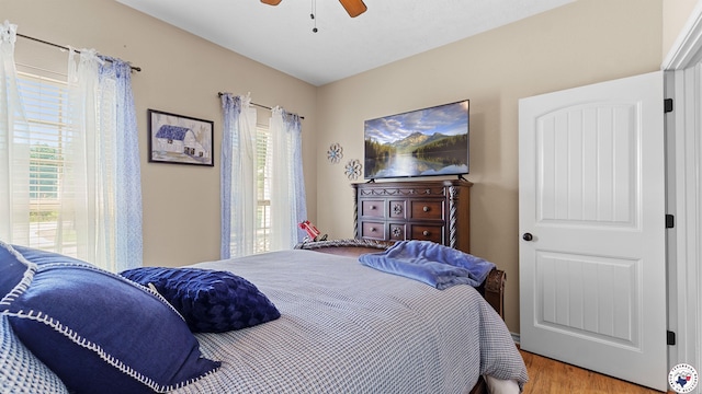908 Arnold Ln, Texarkana, TX 75503 - bedroom featuring wood finished floors and a ceiling fan