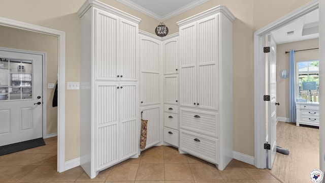 908 Arnold Ln, Texarkana, TX 75503 - hall featuring light tile patterned flooring and crown molding