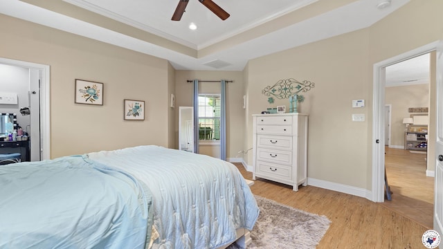 908 Arnold Ln, Texarkana, TX 75503 - bedroom featuring light wood-style floors, crown molding, recessed lighting, a raised ceiling, and ceiling fan