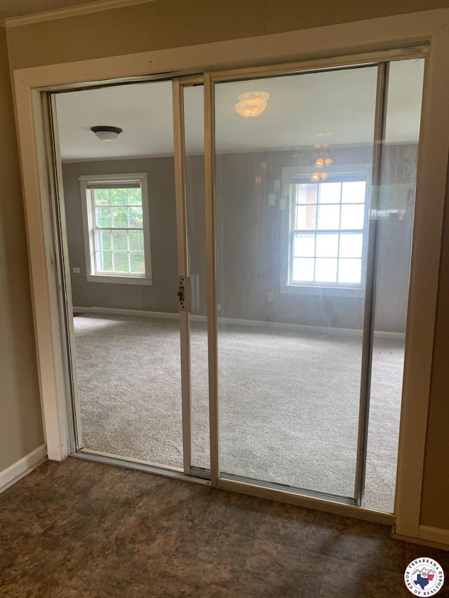 209 E 35th St, Texarkana, AR 71854 - empty room featuring dark colored carpet