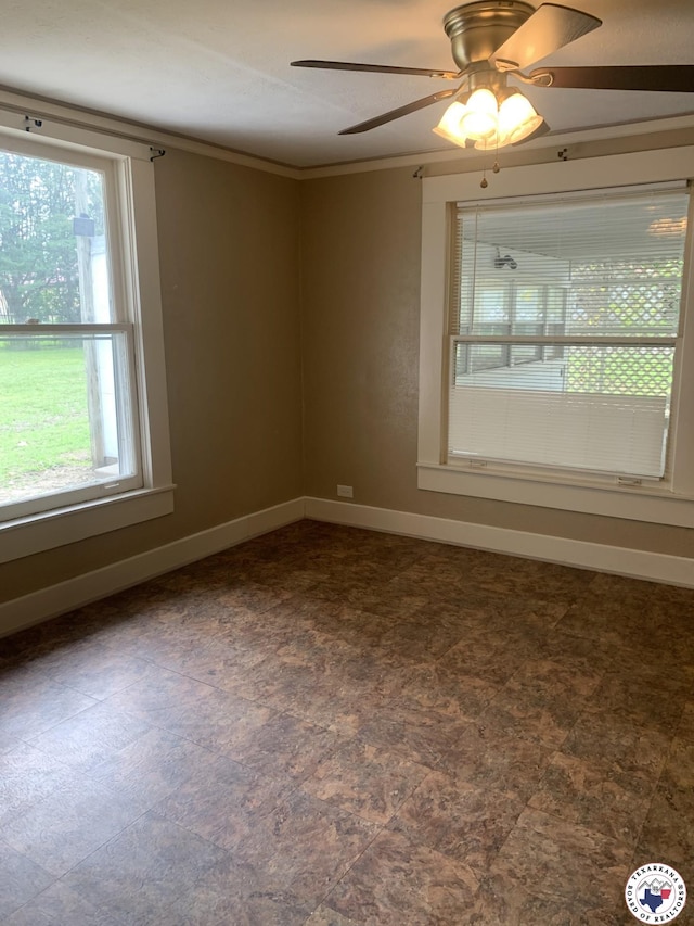 209 E 35th St, Texarkana, AR 71854 - spare room featuring healthy amount of natural light, a ceiling fan, and ornamental molding