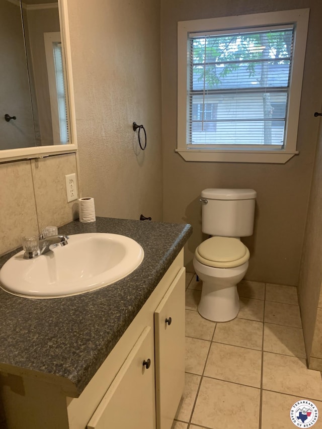 209 E 35th St, Texarkana, AR 71854 - bathroom featuring vanity and tile patterned floors