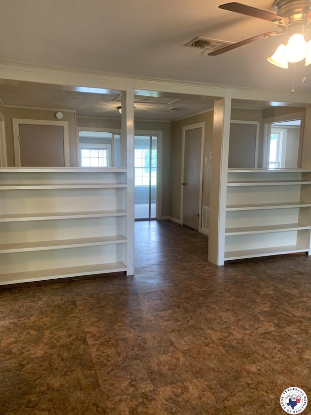 209 E 35th St, Texarkana, AR 71854 - empty room featuring healthy amount of natural light, a ceiling fan, and crown molding