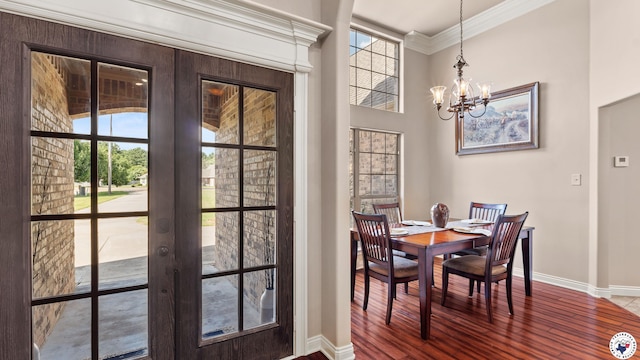 6 Stonewall Cir, Texarkana, TX 75503 - dining space featuring crown molding, a chandelier, wood finished floors, and french doors
