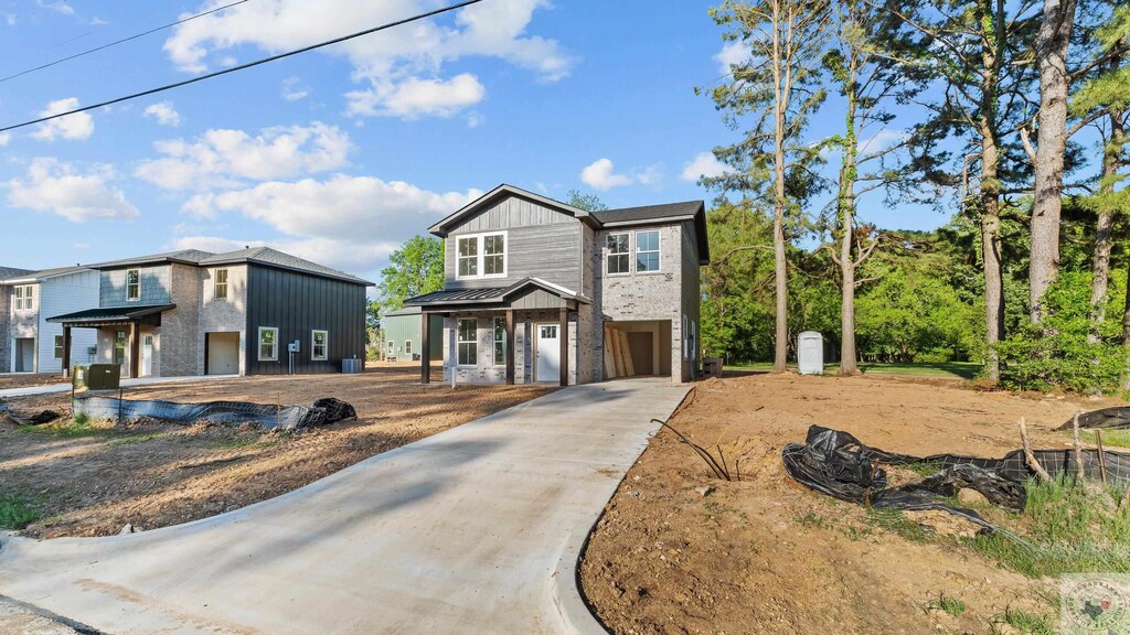 5808 Cooks Ln, Texarkana, TX 75503 - modern farmhouse featuring covered porch