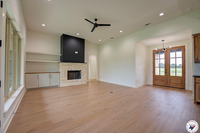101 Ranch Rd, Texarkana, TX 75503 - unfurnished living room featuring a ceiling fan, plenty of natural light, light wood-style flooring, and recessed lighting