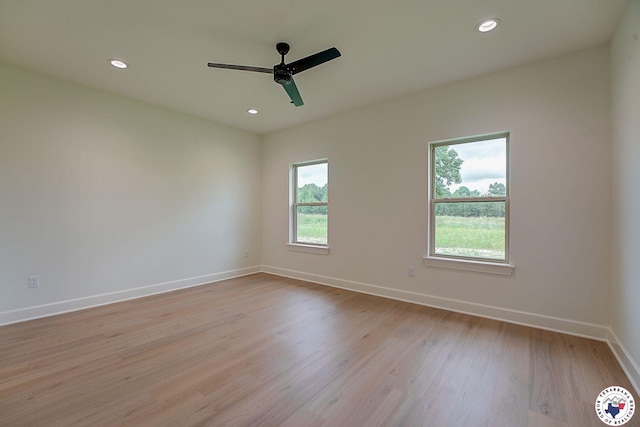 101 Ranch Rd, Texarkana, TX 75503 - spare room featuring light wood-type flooring, baseboards, ceiling fan, and recessed lighting