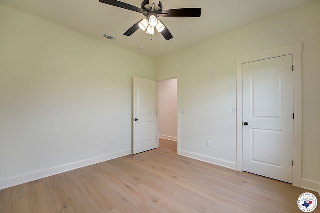 101 Ranch Rd, Texarkana, TX 75503 - unfurnished bedroom featuring light wood-style floors, baseboards, and a ceiling fan