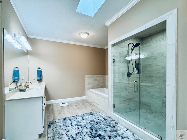 4604 Suzanne Dr, Texarkana, TX 75503 - full bathroom featuring vanity, crown molding, a skylight, and a shower stall