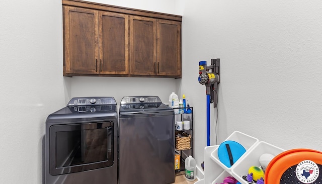 5616 Deaton Pl, Texarkana, TX 75503 - laundry area with washer and dryer and cabinet space