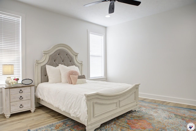 5616 Deaton Pl, Texarkana, TX 75503 - bedroom with multiple windows, light wood-style flooring, and baseboards