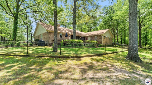 905 Lakeridge Ln, Texarkana, TX 75503 - view of front of property featuring brick siding and a chimney
