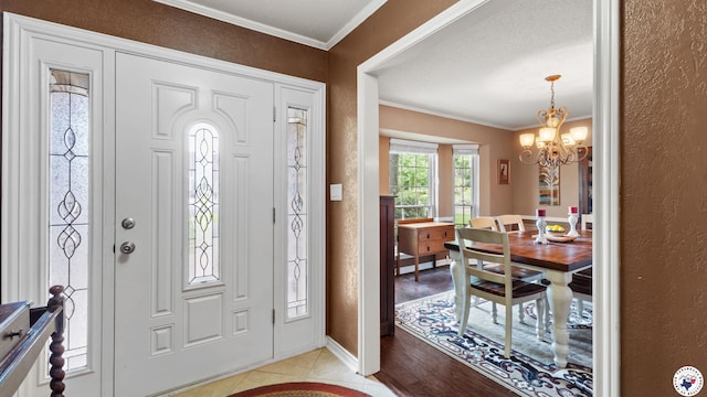 905 Lakeridge Ln, Texarkana, TX 75503 - foyer entrance with a chandelier, crown molding, and baseboards