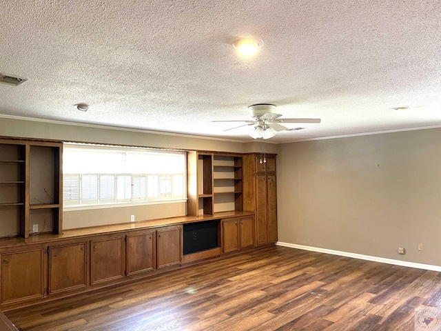 unfurnished living room with ceiling fan, crown molding, dark hardwood / wood-style flooring, and a textured ceiling