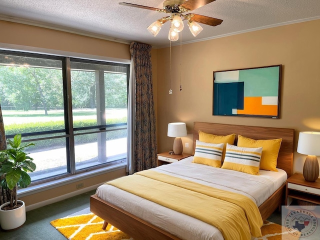 carpeted bedroom with crown molding, multiple windows, a textured ceiling, and ceiling fan