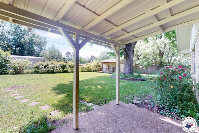 view of yard featuring fence and a patio area