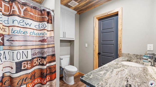 154 Serenity Loop, Glenwood, AR 71943 - full bath with wooden ceiling, wood finished floors, toilet, vanity, and a shower with shower curtain