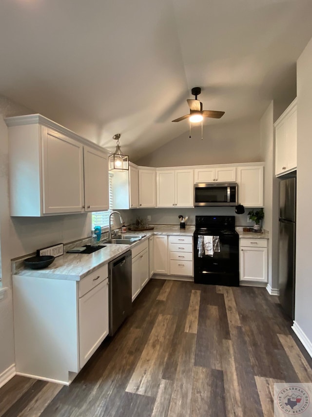 kitchen with sink, white cabinetry, dark hardwood / wood-style floors, and black appliances