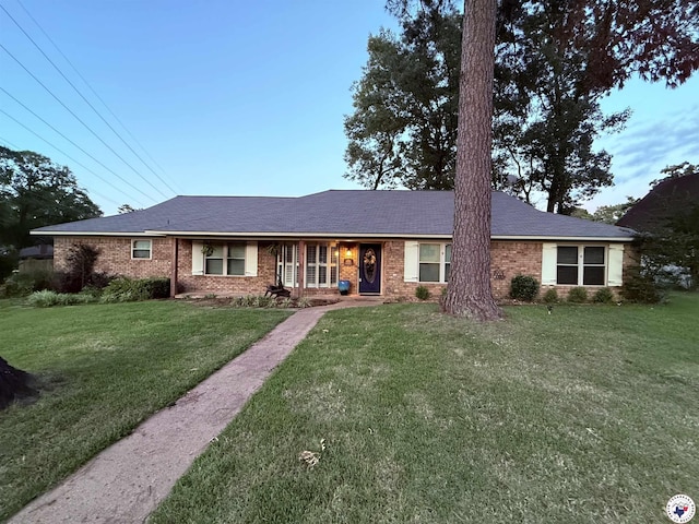 6010 Shadyside Ln, Texarkana, TX 75503 - single story home with a front lawn and brick siding