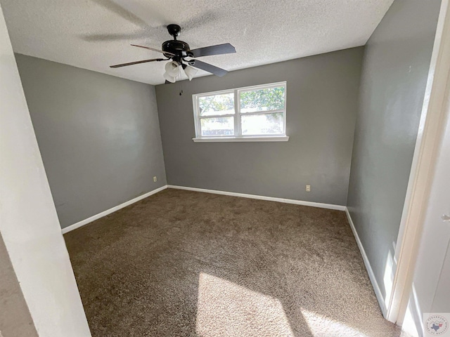 unfurnished room with a textured ceiling, carpet floors, and ceiling fan