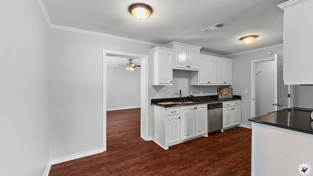 3 Sheri Ln, Texarkana, TX 75503 - kitchen featuring dishwasher, dark countertops, ornamental molding, white cabinets, and dark wood-style flooring