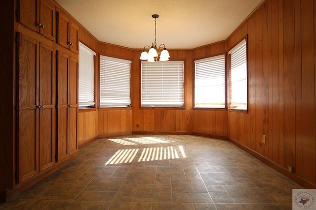 interior space featuring a chandelier