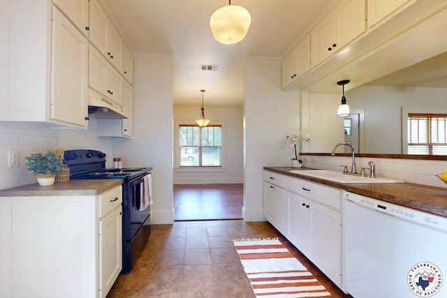 2124 Stevenson St, Texarkana, TX 75501 - kitchen featuring dishwasher, black range with electric stovetop, under cabinet range hood, and healthy amount of natural light