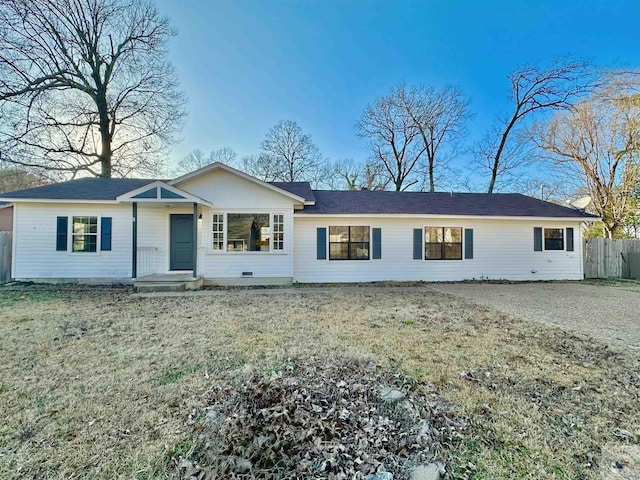 ranch-style house with a front yard