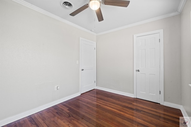 unfurnished bedroom featuring dark hardwood / wood-style floors, ceiling fan, and ornamental molding