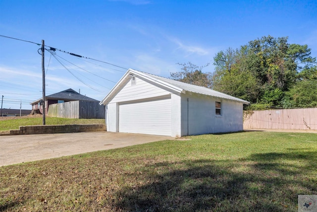 garage with a yard