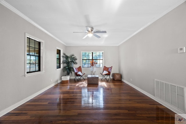 unfurnished room with ceiling fan, crown molding, and dark wood-type flooring