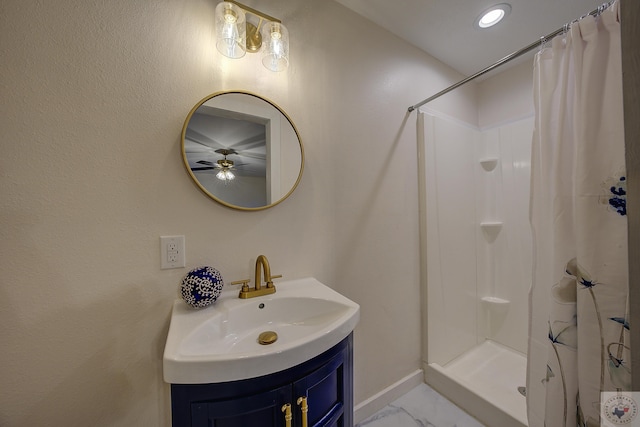 bathroom featuring vanity and a shower with curtain