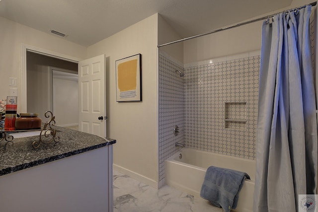 bathroom featuring shower / bath combination with curtain and vanity